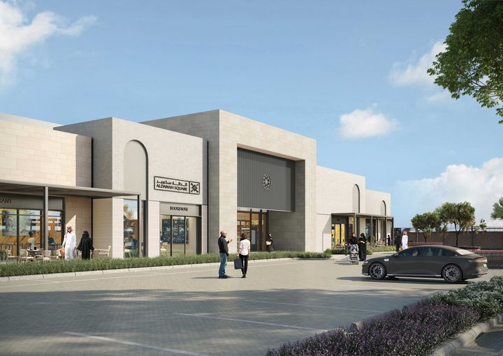 Architectural visualisation of the entrance to Al Danah Square, with a bookshop, other shops, pedestrians and a forecourt.